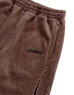 sweats brown gold closeup